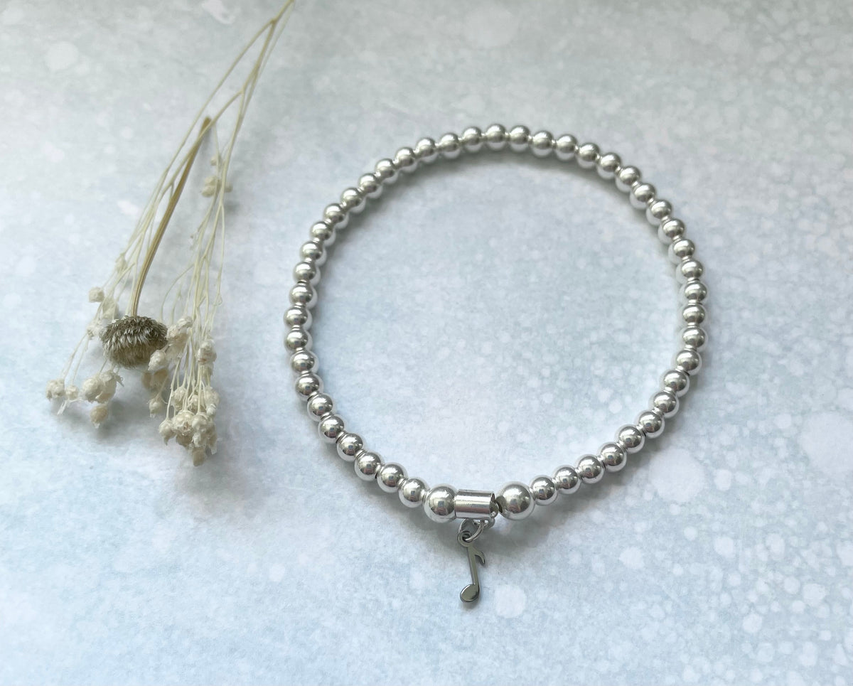 Sterling Silver Bead Music Note Bracelet